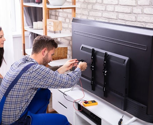 About Tekno TV Service - Technicians at Work